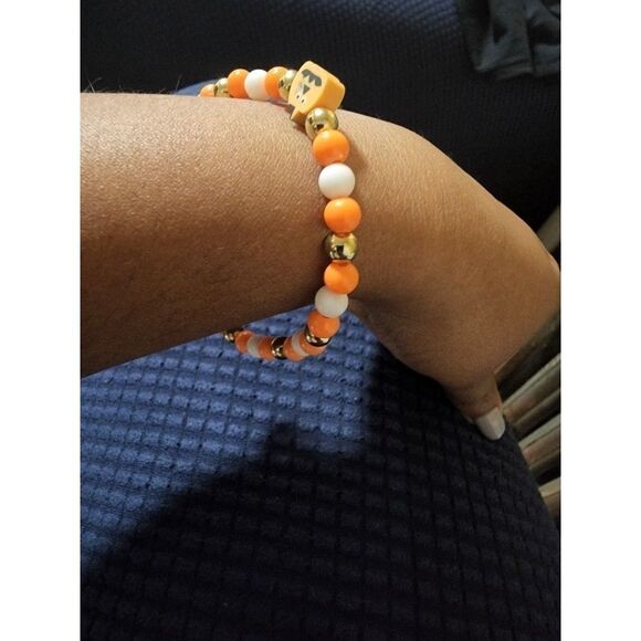 Handmade Orange and White Halloween Stretch Bracelet with Pumpkin - Picture 1 of 11